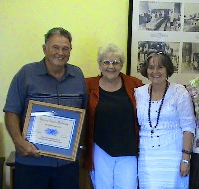John and Gwen receive honorary lifetime memberships of the BRGHS from Senator Claire Moore after his retirement in 2007. 